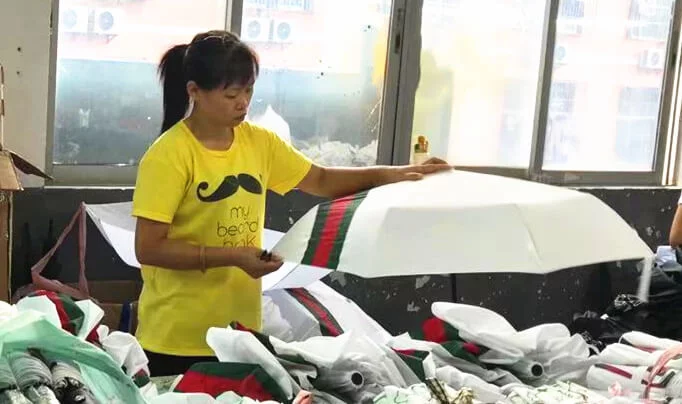Checking umbrella labels packaging and carton markings
